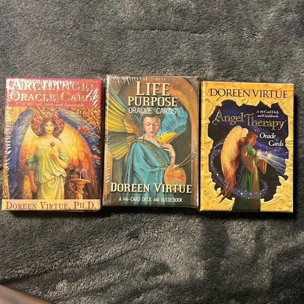Doreen Virtue oracle cards x3. Two packs are sealed and never opened (last 2).